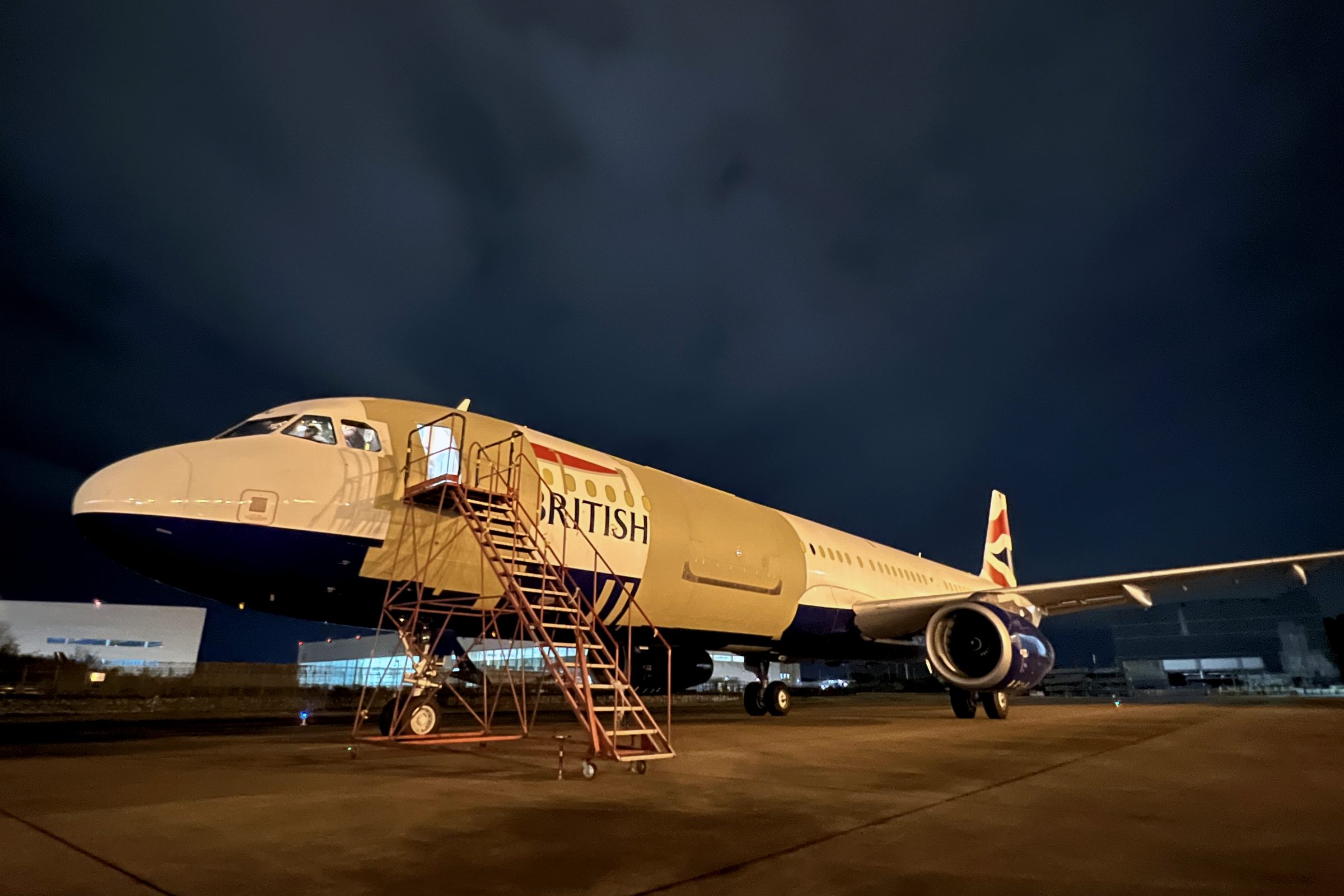 Aircraft on a maintenance stand at dusk in Vietnam